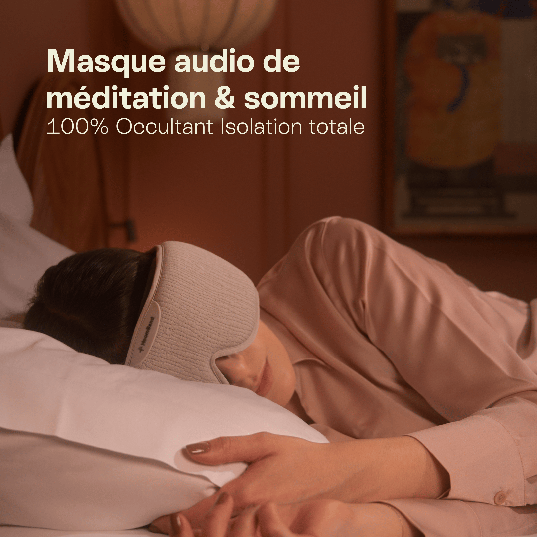 Woman sleeping with a wireless audio sleep and meditation mask in a cozy bedroom