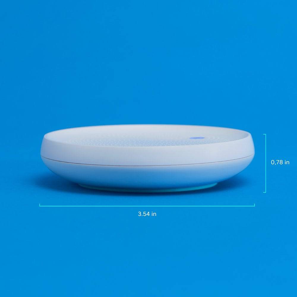 Dodow sleep aid by LIVLAB, featuring a simple design with a light guide for relaxation and sleep improvement.