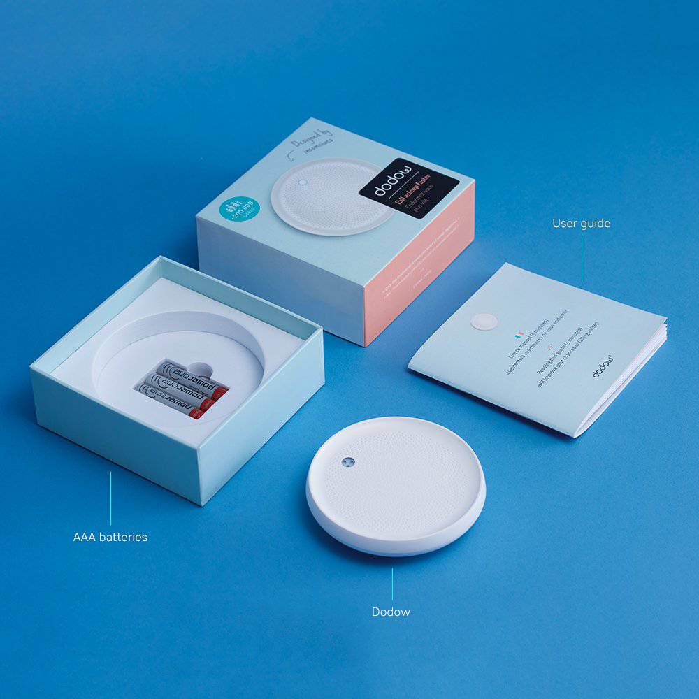 Dodow sleep aid by LIVLAB, featuring a sleek design with a glowing light for guided breathing exercises.