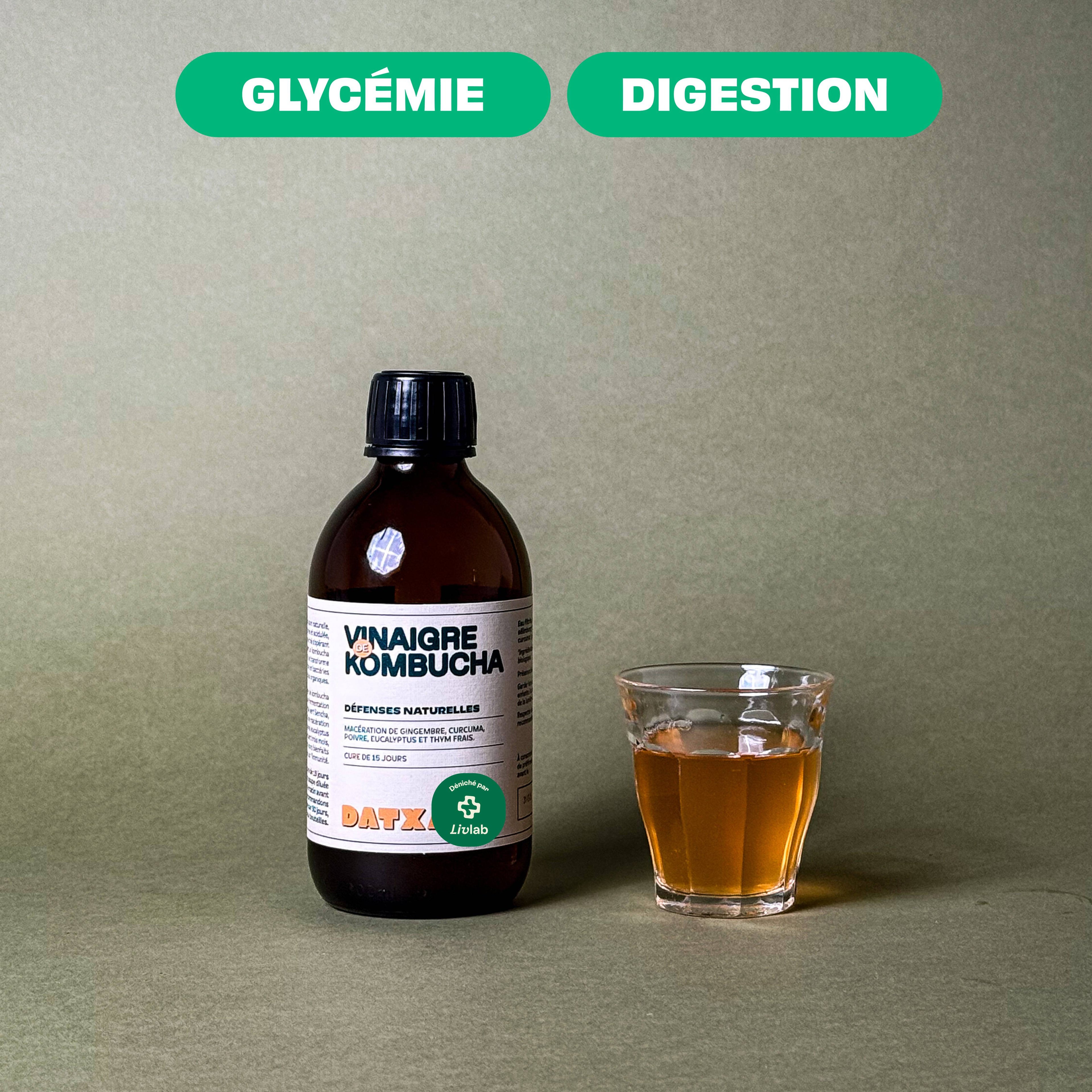 Bottle of Livlab 300 ml Kombucha vinegar, showcasing its rich amber color and fermentation bubbles.