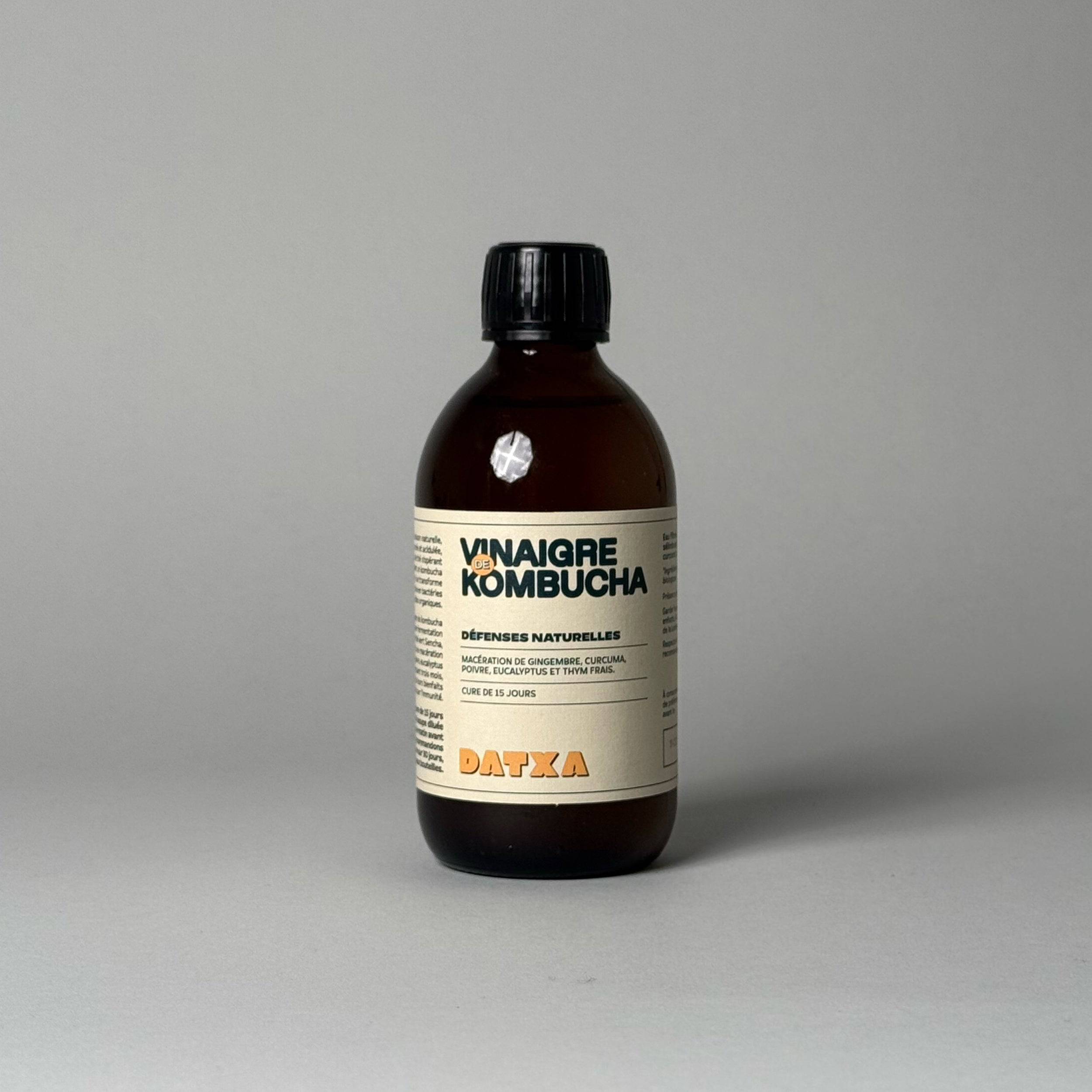 Fermented Livlab Kombucha vinegar in a 300 ml bottle, showcasing its amber color and label design.