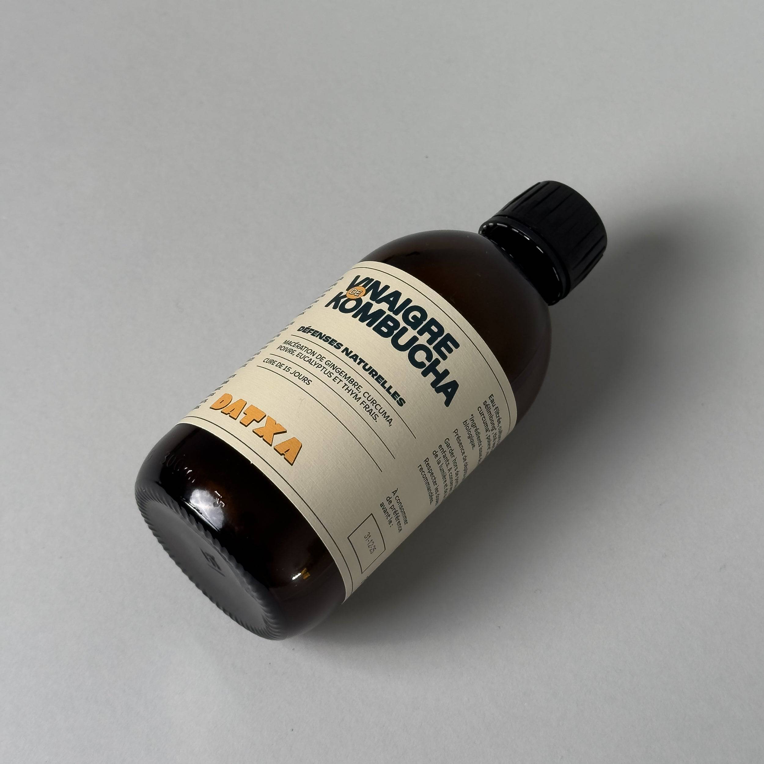 Bottle of Livlab Kombucha Vinegar, 300 ml, showcasing its rich color and label design against a clean background.