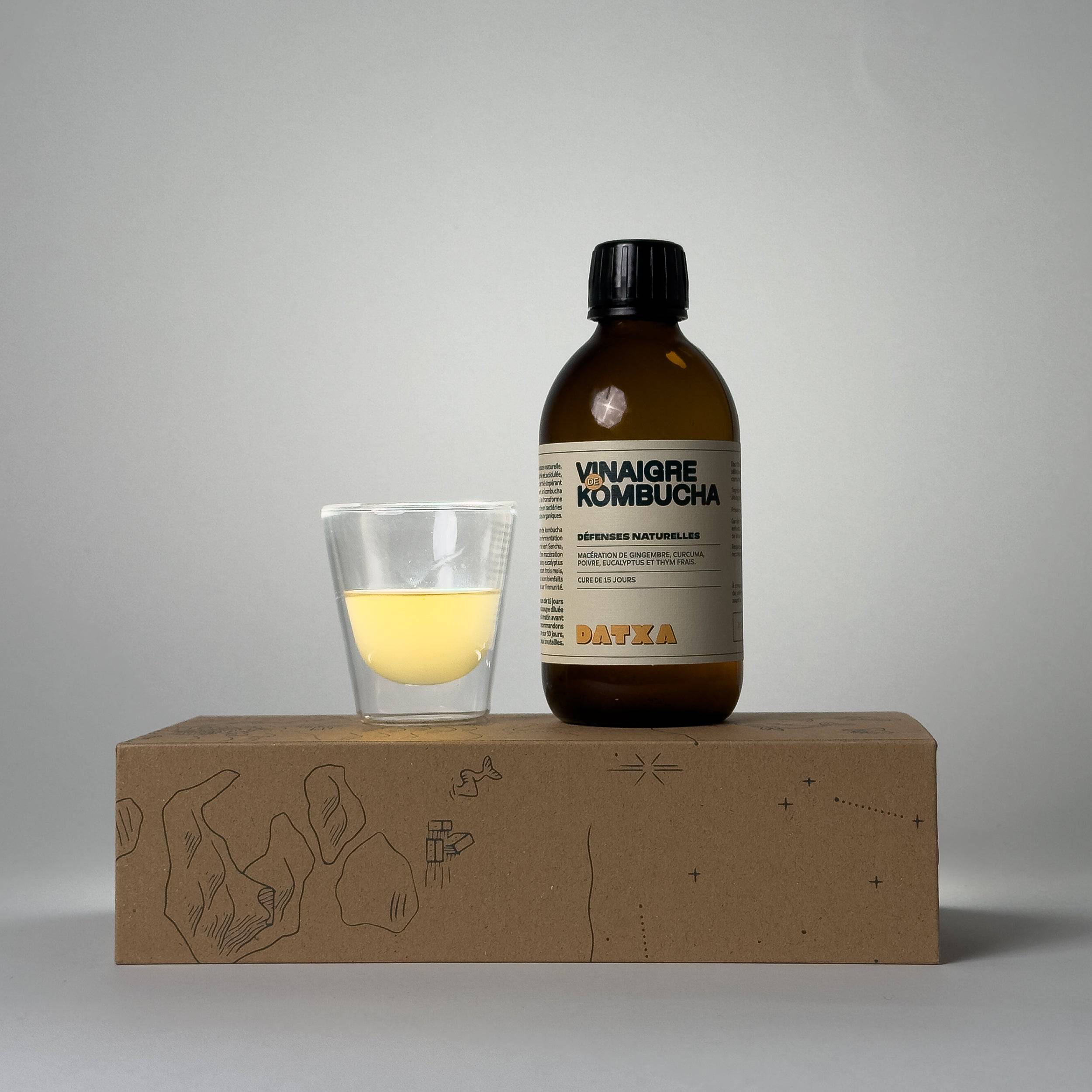 Fermented Livlab Kombucha vinegar in a clear 300 ml bottle, showcasing its rich color and label design.
