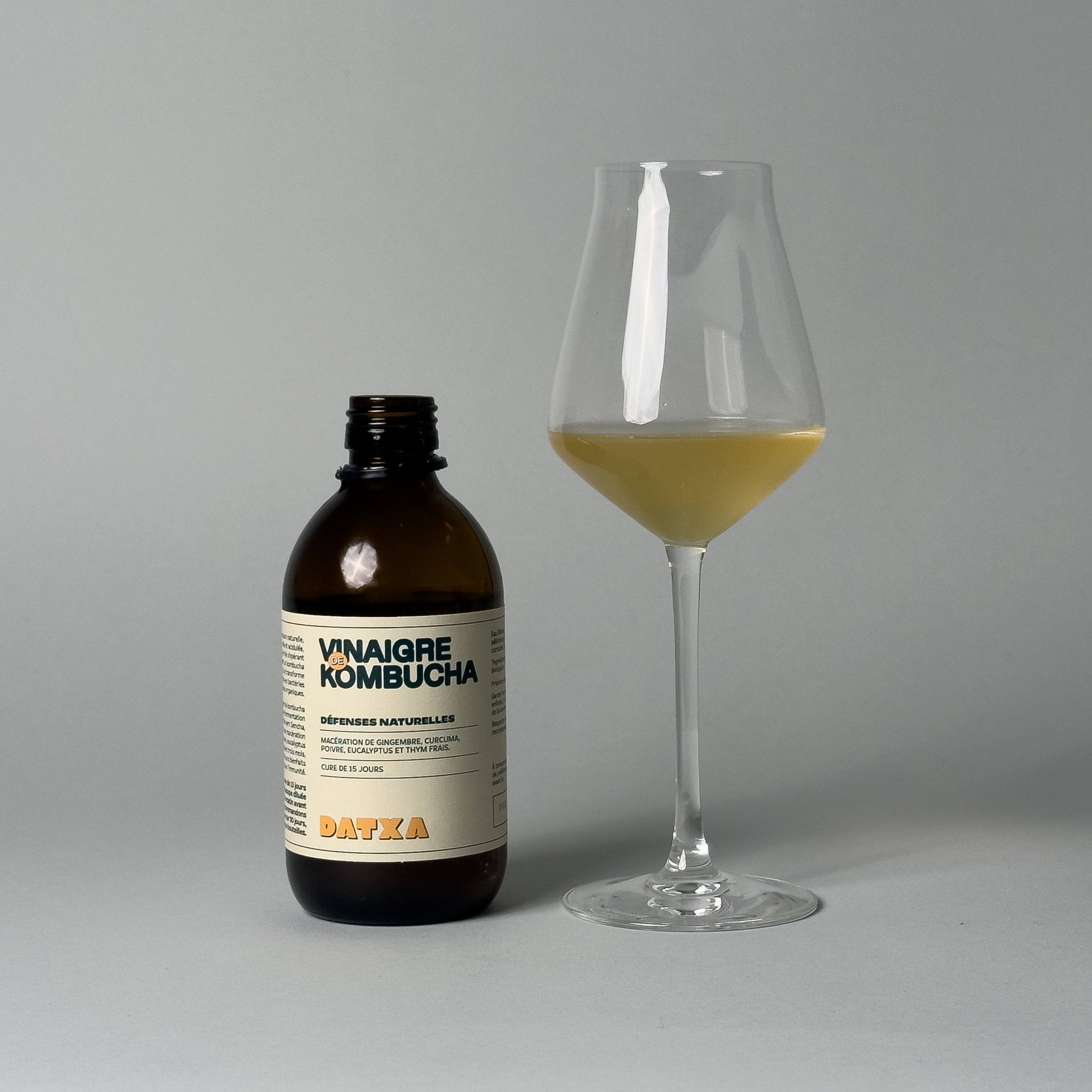 300 ml bottle of Livlab Kombucha vinegar with a clear liquid and a label showcasing its fermented nature.